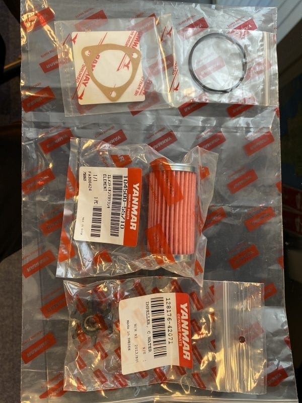 Multi-pack of New Yanmar parts, including: Fuel Filter 104500-55710 (£5) Water Pump Impeller (£40) Raw Water Pump Gasket (£5) Rubber Seal